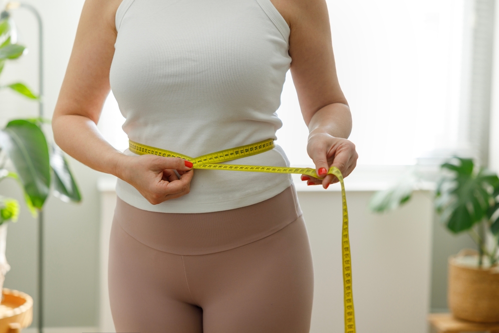 woman tracking her medical weight loss in Olney MD